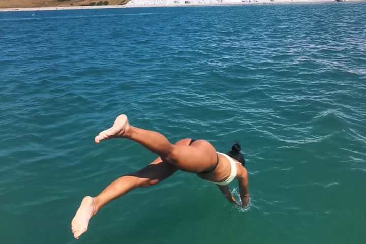 a boat parked next to a body of water