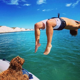 a man and woman swimming in the water