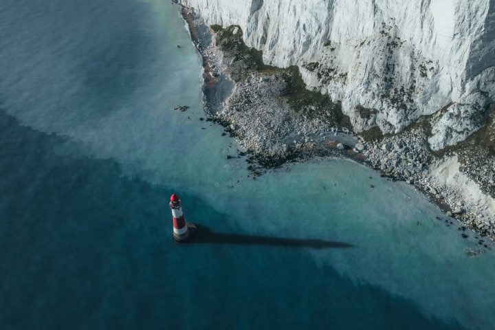 a person riding a wave on top of a mountain
