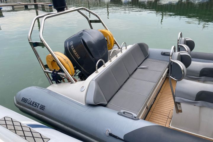a boat sitting on top of a body of water